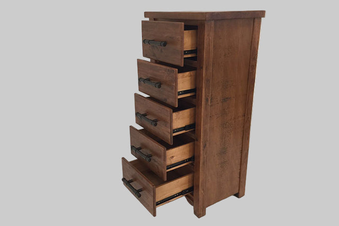 Wooden slimboy with multiple drawers on a white background