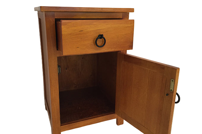 Wooden cabinet with a drawer and open door on a white background